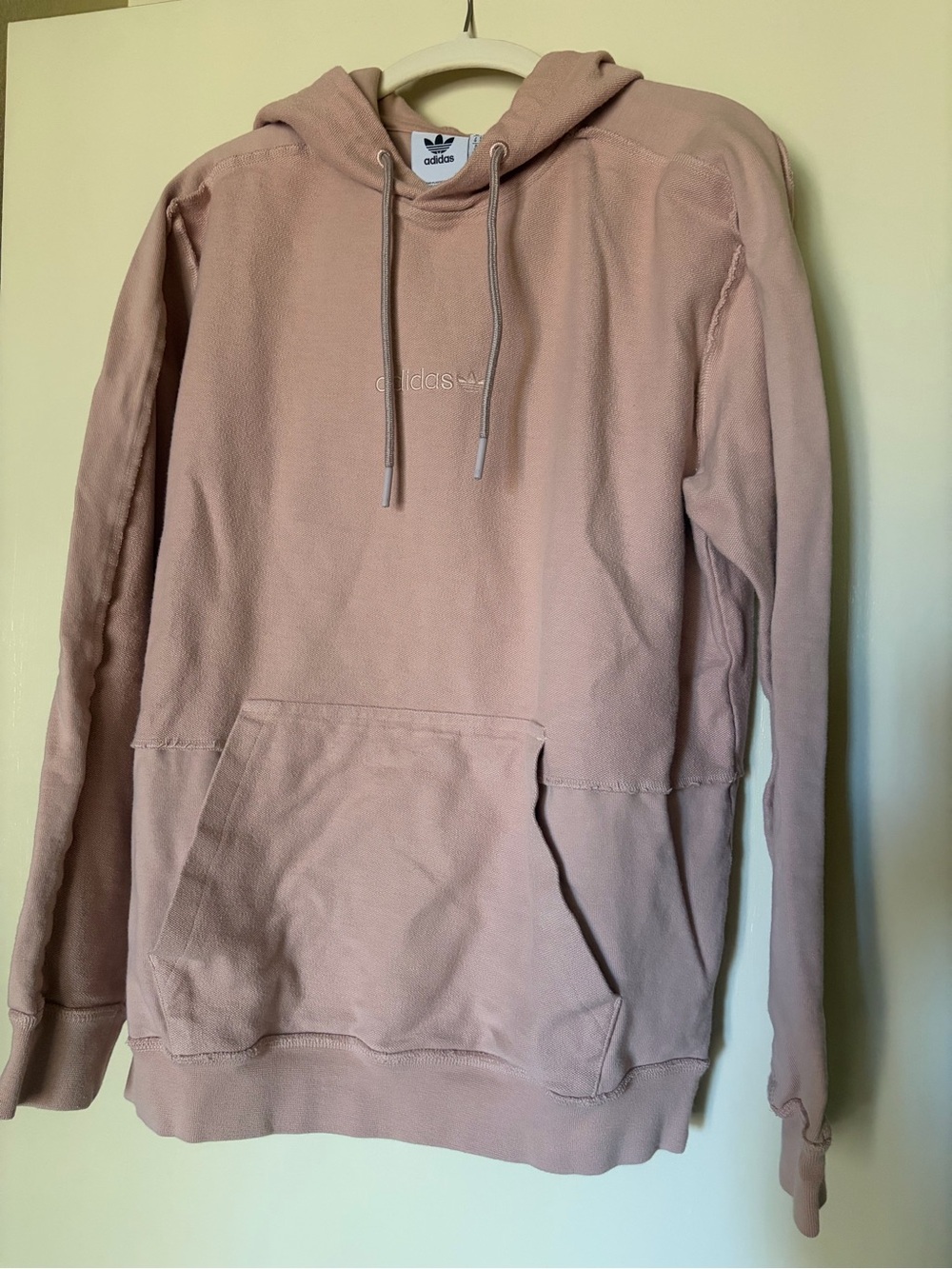Adidas light pink hoodie with logo on front and back